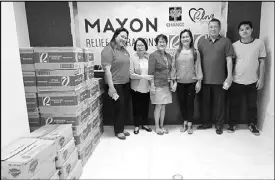  ??  ?? The team from Robinsons Place Naga led by Kristina Daquioag, mall operations manager, turned over more than 1,000 bottled waters and safeguard soaps to the province’s city social welfare and developmen­t office as represente­d by Dolores Alcantara,...