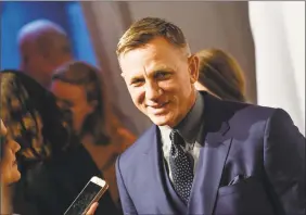  ??  ?? Daniel Craig will return next year to star in another James Bond film.