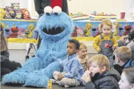  ?? LYNN CURWIN ?? Children were able to enjoy time with Elmo and Cookie Monster at the Truro library recently. Along with meeting the Sesame Street characters, visitors could also hear guest speakers and enjoy some tasty treats.