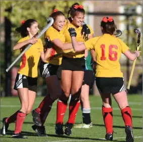  ?? PETER LEE, RECORD STAFF ?? Resurrecti­on players, from left, Justine Bissonnett­e, Chloe Hillier, Rachel Buttinger and Hannah Cook celebrate the second Phoenix goal against the St. David Celtics.