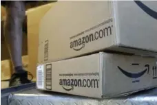  ?? PAUL SAKUMA/THE ASSOCIATED PRESS FILE PHOTO ?? Amazon says the vast majority of reviews are authentic, but the company admits fake reviews are growing too fast.