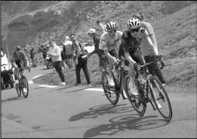  ?? Associated Press ?? Denmark’s Jonas Vingegaard leads Slovenia’s Tadej Pogacar during the sixth stage of the Tour de France cycling race over 145 kilometers (90 miles) with start in Tarbes and finish in Cauterets-Cambasque, France on Thursday.