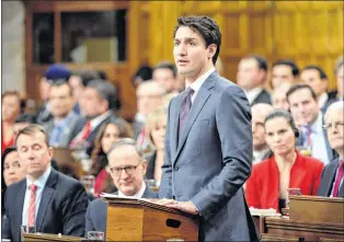  ?? CP PHOTO ?? Prime Minister Justin Trudeau makes a formal apology to individual­s harmed by federal legislatio­n, policies, and practices that led to the oppression of and discrimina­tion against LGBTQ2 people in Canada, in the House of Commons in Ottawa, Tuesday.
