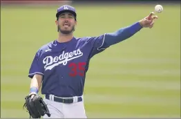  ?? ROSS D. FRANKLIN — THE ASSOCIATED PRESS ?? Cody Bellinger played in a Cactus League game for the first time this year, Bellinger went 0 for 3 at the plate and said his surgically repaired right shoulder felt great.