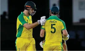  ?? Photograph: Randy Brooks/AFP/Getty Images ?? Mitchell Marsh and Aaron Finch put on a second wicket stand of 114 off 63 balls in Saint Lucia.