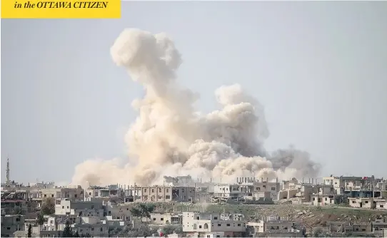  ?? MOHAMAD ABAZEED / AFP / GETTY IMAGES ?? Smoke billows amid reports of air strikes on a rebel-held area in the southern Syrian city of Daraa on Monday. Canadian military planners are considerin­g what role, if any, Canada’s forces might have in Syria — or an expanded role in Iraq — as the Trump White House weighs a possible expansion of its presence in the Middle East.