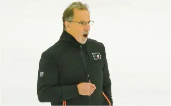  ?? LATE THURSDAY MATT ROURKE/AP ?? Flyers coach John Tortorella won his 700th career game on Thursday night.
FLYERS