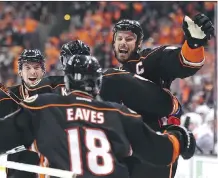  ?? HARRY HOW/ GETTY IMAGES ?? Anaheim Ducks captain Ryan Getzlaf, right, has a “lot of good memories” from his time with the Calgary Hitmen.