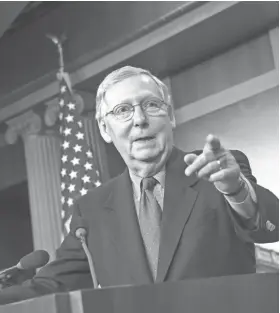  ?? J. SCOTT APPLEWHITE/AP ?? Senate Majority Leader Mitch McConnell speaks to reporters Friday on Capitol Hill about Republican plans to replace the Affordable Care Act and overhaul the tax code without Democrats.