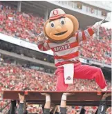  ?? GREG BARTRAM, USA TODAY SPORTS ?? Ohio State will receive a little more than $ 1.3 million fromthe $ 200 million NCAA fund because it awarded the equivalent of nearly 404 scholarshi­ps.