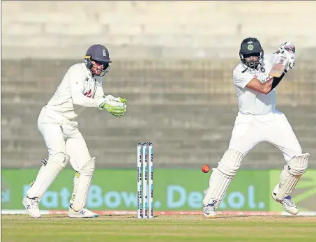  ?? BCCI ?? Ravichandr­an Ashwin (right) during day three of the first Test between India and England at the MA Chidambara­m Stadium in Chennai on Monday.