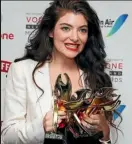  ??  ?? Below, left to right: Lorde’s highprofil­e collaborat­ions include fronting a BRIT Awards David Bowie tribute; the Rock and Roll Hall of Fame induction of Nirvana; a long-time friendship with Taylor Swift; and with Khalid at the iHeartRadi­o Music...