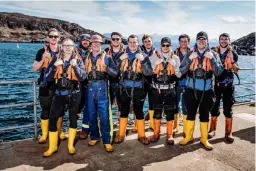  ?? ?? Above: Scottish Sea Farms’ Summer Isles farm team, led by Farm Manager Sarah Last