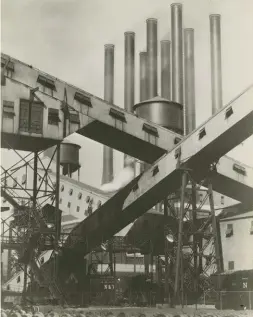  ??  ?? Charles Sheeler (1883-1965), Criss-crossed Conveyors, River Rouge Plant, 1927, printed 1929. Gelatin-silver print, 107/8 x73/8 in. From the collection­s of the Henry Ford, Dearborn, Michigan.