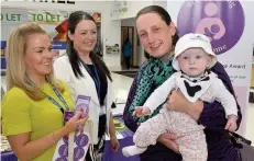  ??  ?? Support Nutritioni­st Susan Short, LBI’S Tammy Cahill, Anne Wilson and baby Mhairi (six months)