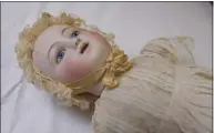  ?? ?? A china doll (ca. 1930s), part of Keeler Tavern Museum’s “A Family Christmas at the Cannon Ball House.”