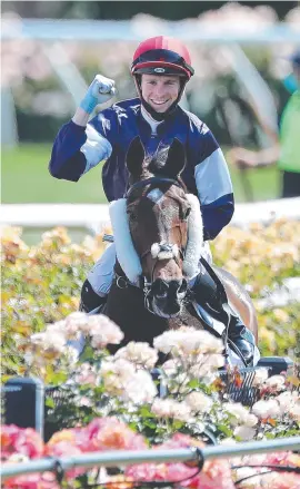  ?? ?? Jye McNeil and Twilight Payment win the Melbourne Cup. Picture: Alex Coppel.