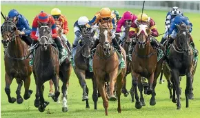  ?? GETTY IMAGES ?? Te Akau Shark (white blaze) storms home to win yesterday.