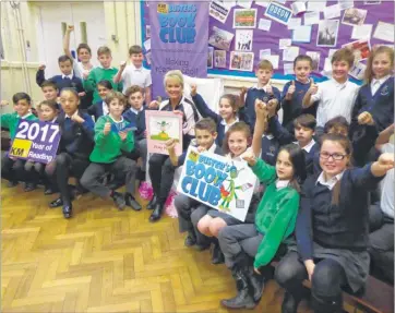  ?? Picture: Simon Dolby FM4670128 ?? Willow Class pupils at West Borough Primary meet KM Charity Team honorary patron Cheryl Baker. The class won a story time session with Cheryl for the entire school