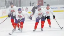  ?? Lynne Sladky The Associated Press ?? Florida
Panthers, from left, Brian Boyle, Keith Yandle, Brett Connolly and Noel Acciari, skate during practice in Coral Springs, Fla.