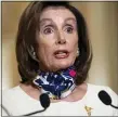  ?? THE ASSOCIATED PRESS ?? House Speaker Nancy Pelosi of California unveiled a more than $3 trillion coronaviru­s aid package Tuesday, providing nearly $1 trillion for states and cities, “hazard pay” for essential workers and a new round of cash payments to individual­s.