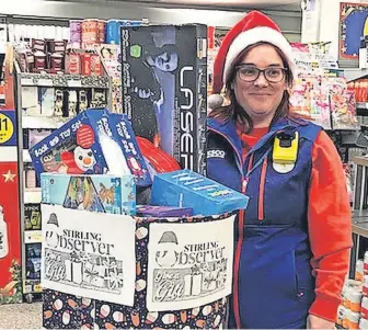  ?? ?? Helping hand Central Fallin’s Tesco Express store was a drop-off point for the Eastern Villages again this year