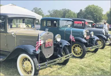  ?? PHOTOS BY KEVIN MARTIN — THE MORNING JOURNAL ?? The Lorain Community Senior Center welcomed classic cars and enthusiast­s on Aug. 22for an All Star Vintage Car Show in support of programs and services.