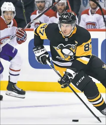  ?? Peter Diana/Post-Gazette ?? Penguins captain Sidney Crosby and his team are only two games into the season. With a win and a loss in hand, though, coach Mike Sullivan wants to see more from his squad.