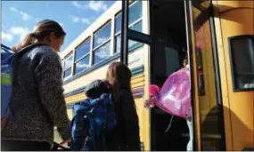  ?? SUBMITTED PHOTO ?? Students board their bus at the end of the school day at Glen Acres Elementary School.