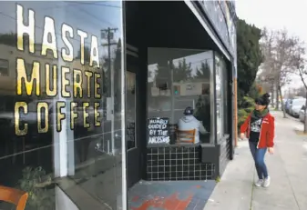  ?? Paul Chinn / The Chronicle ?? A barista at Oakland’s Hasta Muerte Coffee refused to serve an officer in uniform in February. The owners expressed concern for customers’ and workers’ “physical and emotional safety.”