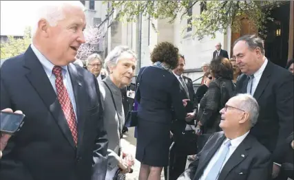  ?? Darrell Sapp/Post-Gazette ?? Former Pennsylvan­ia Gov. Tom Corbett, Ginny Thornburgh and her husband, former Gov. Dick Thornburgh, talk after the services for Henry Hillman on Friday at Calvary Episcopal Church in Shadyside.