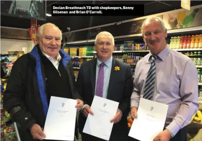  ??  ?? Declan Breathnach TD with shopkeeper­s, Benny Gilsenan and Brian O’Carroll.