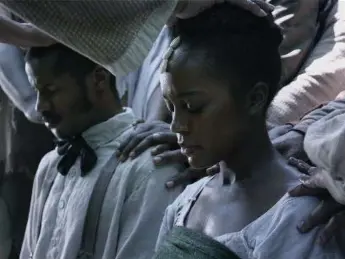  ?? ELLIOT DAVIS ?? Nate Parker, left, and Aja Naomi King star in Birth of a Nation, an epic saga also directed and produced by Parker.