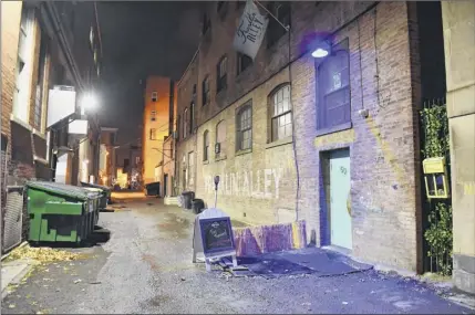  ??  ?? the entrance to the club, which opened in december 2017, is along this alley off of State Street in troy.