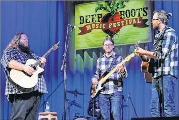  ?? WENDY ELLIOTT ?? Matt Andersen, pictured here playing alongside the Scott and Ryan Hupman of the Hupman Brothers, played at the festival in 2015.