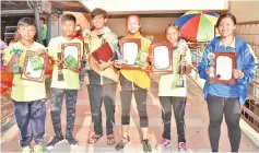  ??  ?? THE BEST: The 51st MSSD Kota Kinabalu track and field championsh­ip Best Athletes award recipients.