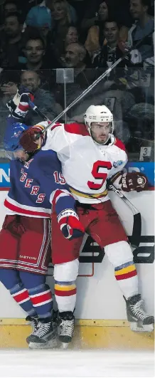  ?? NHLI VIA GETTY IMAGES ?? Daniel Pribyl, shown playing for HC Sparta Prague against the New York Rangers at the 2011 NHL Compuware Premiere Challenge, isn't an instant fix for the Flames, says GM Brad Treliving.