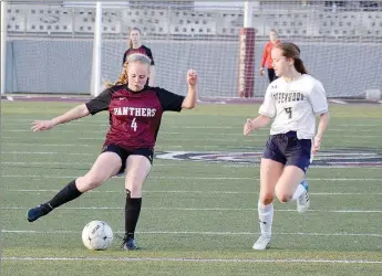  ?? Graham Thomas/Siloam Sunday ?? Siloam Springs midfielder Macie Herrel takes a touch on the ball during a 2019 game against Greenwood. Herrel is one of the Lady Panthers’ top midfielder­s heading into the 2021 season.