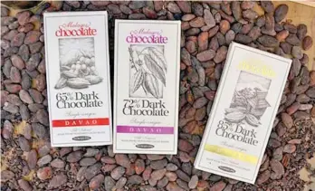  ??  ?? WINNERS. Malagos Chocolate's 100 percent Unsweetene­d Chocolate (not in photo) and Malagos 65 percent Dark Chocolate (left) were recently given recognitio­n in the 2017 Great Taste competitio­n in London, United Kingdom.