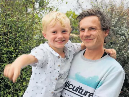  ??  ?? Nekko Haworth and his father, Tom. The 6-year-old died after falling from a boat in Marlboroug­h.