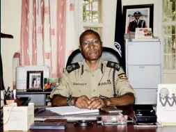  ??  ?? Kasingye, Uganda’s Interpol chief, in his office