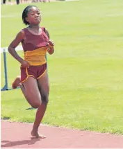  ??  ?? Kedibone Matlou from Ernest Matlou Primary School finishes the u.12 girls 200 m in a time of 33,13 seconds.