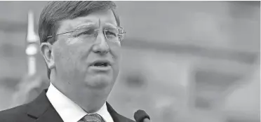  ?? ROGELIO V. SOLIS/AP ?? “The governor’s office is getting out of the business of telling people what they can and cannot do,” says Mississipp­i Gov. Tate Reeves.