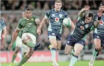  ?? /OISIN KENIRY/GETTY IMAGES ?? Damian Willemse of SA clears the ball past Cian Healy of Ireland during the Autumn Internatio­nal match at Aviva Stadium in Dublin.