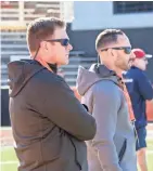  ?? GREGG PACHKOWSKI/PENSACOLA NEWS JOURNAL ?? Green Bay general manager Brian Gutekunst (left) and director of college scouting Jon-Eric Sullivan will be observing players at the NFL combine.