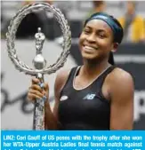  ??  ?? LINZ: Cori Gauff of US poses with the trophy after she won her WTA-Upper Austria Ladies final tennis match against Jelena Ostapenko of Latvia yesterday in Linz, Austria.