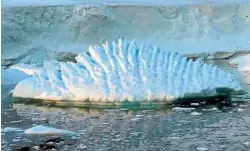  ?? UNIVERSITY OF LEEDS/AP ?? This photo by researcher Andrew Shepherd shows an unusual iceberg melting pattern on the Antarctic Peninsula. A new study has found that the melting of Antarctica is accelerati­ng at an alarming rate.