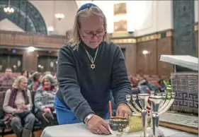  ?? Alexandra Wimley/Post-Gazette ?? Rabbi Cheryl Klein prepares for a Dor Hadash service on Friday at Rodef Shalom in Shadyside.