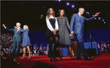  ?? Pablo Martinez Monsivais / Associated Press ?? President Barack Obama acknowledg­es the crowd with first lady Michelle Obama, daughter Malia, Vice President Joe Biden and his wife Jill Biden after his farewell address in Chicago on Tuesday.