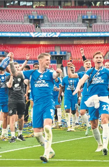  ?? ?? Posh captain Harrison Burrows (right) leads the post-match celebratio­ns at Wembley. Photos David Lowndes and